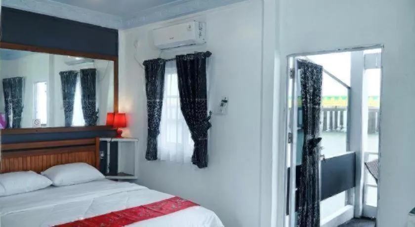 Bed in Sunset Curly Bay Hotel & Resort