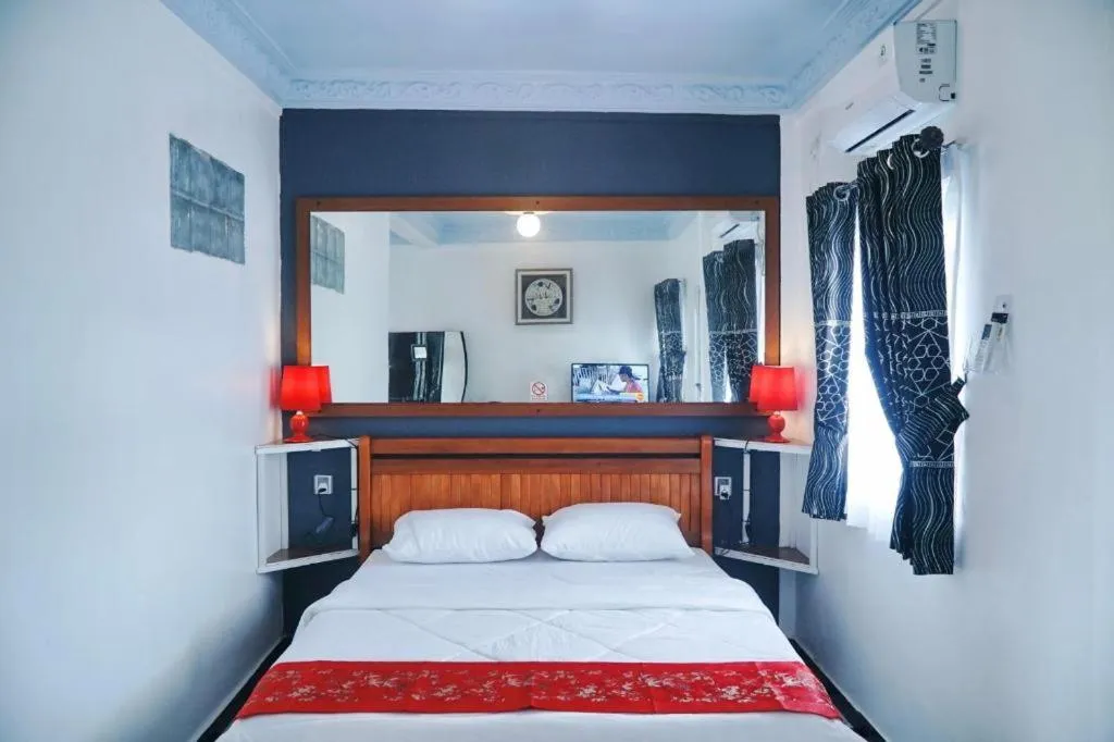 Bed in Sunset Curly Bay Hotel & Resort