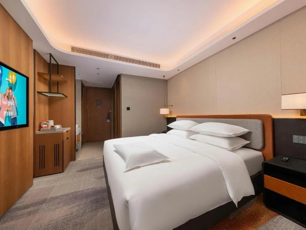 Bed in Park Inn Guangzhou Railway Station Yuexiu International Convention Center