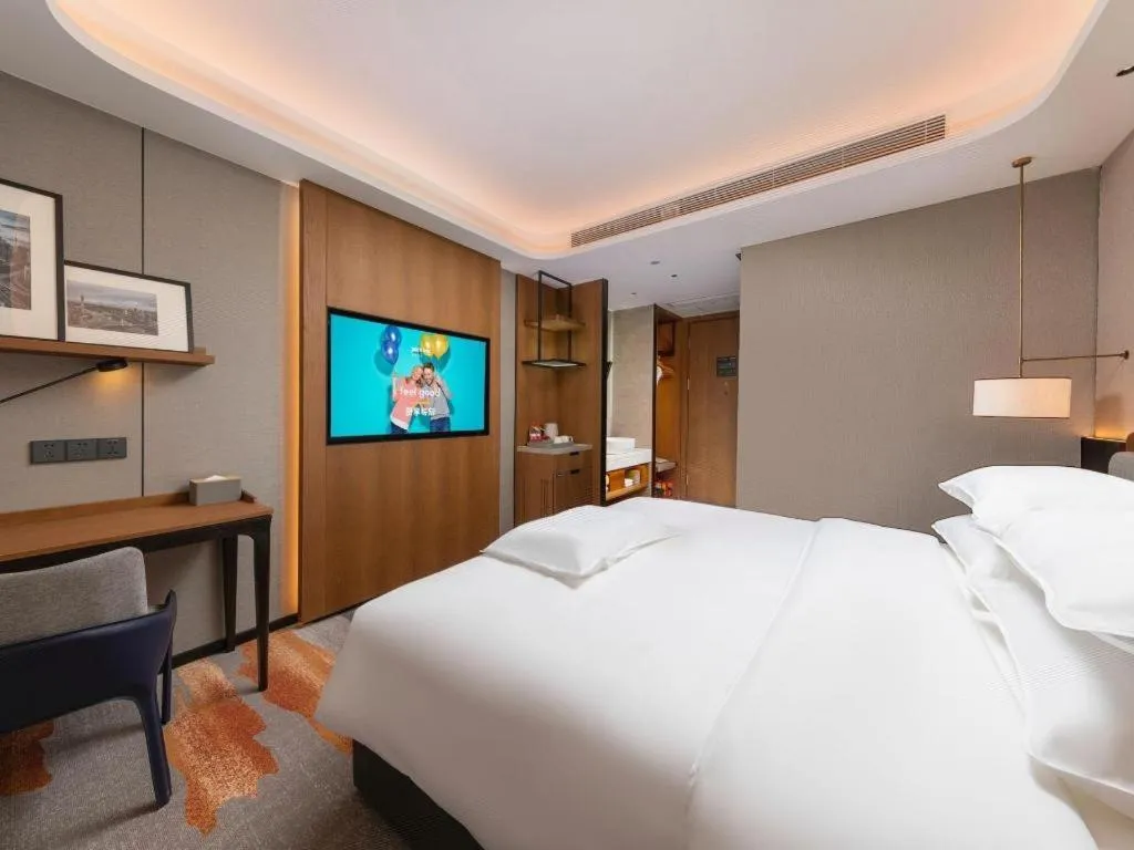 Bed in Park Inn Guangzhou Railway Station Yuexiu International Convention Center