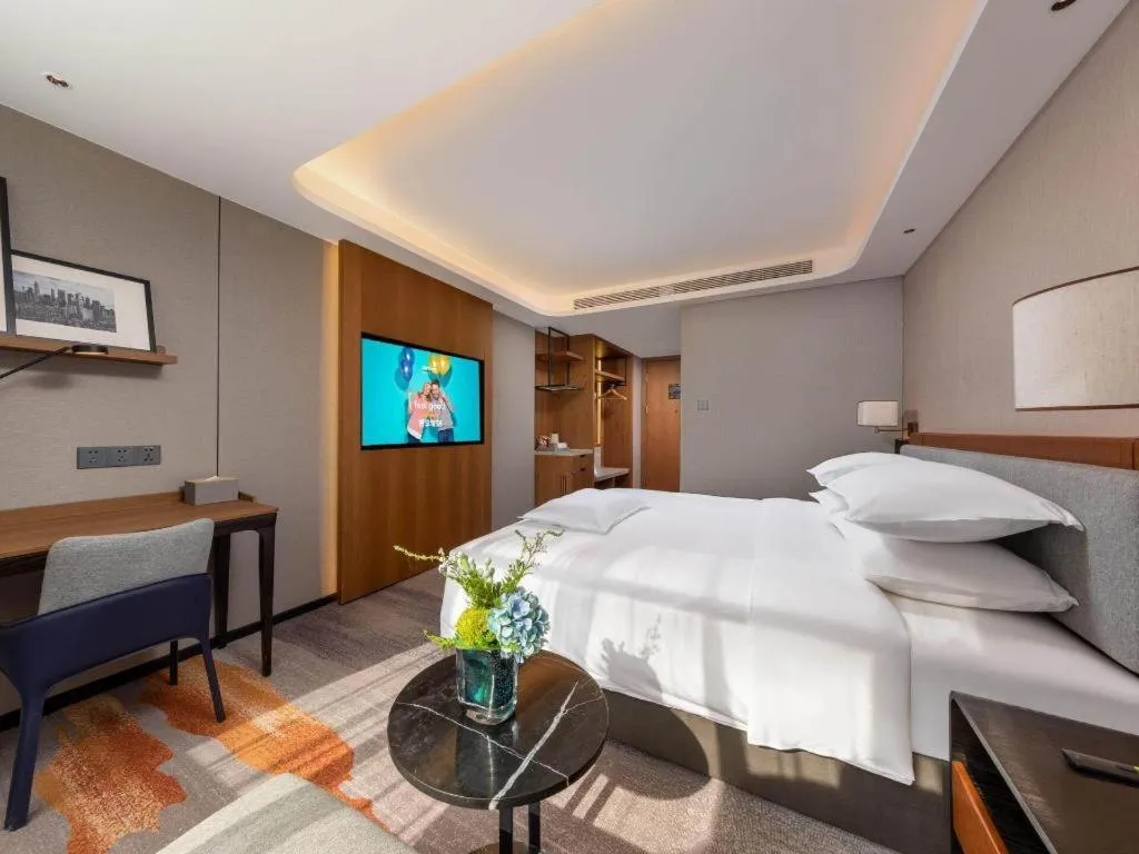 Bed in Park Inn Guangzhou Railway Station Yuexiu International Convention Center