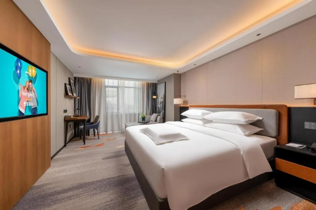 Bed in Park Inn Guangzhou Railway Station Yuexiu International Convention Center