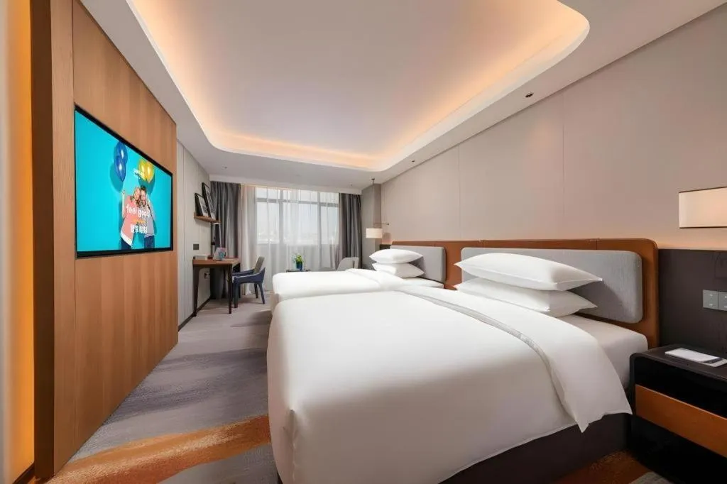 Bed in Park Inn Guangzhou Railway Station Yuexiu International Convention Center