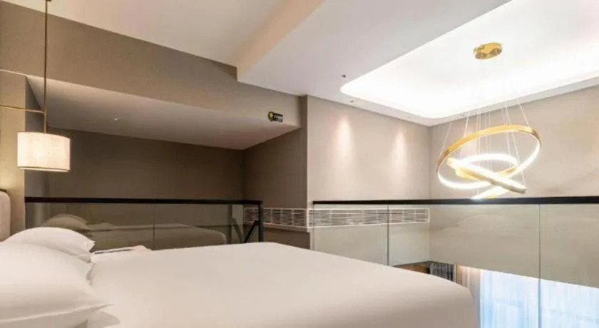 Bed in Park Inn Guangzhou Railway Station Yuexiu International Convention Center