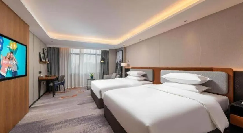 Bed in Park Inn Guangzhou Railway Station Yuexiu International Convention Center