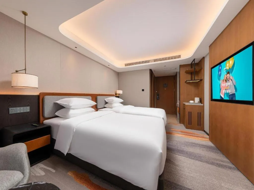 Bed in Park Inn Guangzhou Railway Station Yuexiu International Convention Center