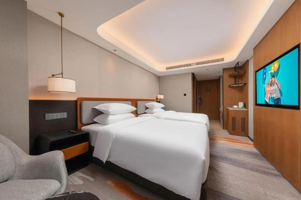 Bed in Park Inn Guangzhou Railway Station Yuexiu International Convention Center