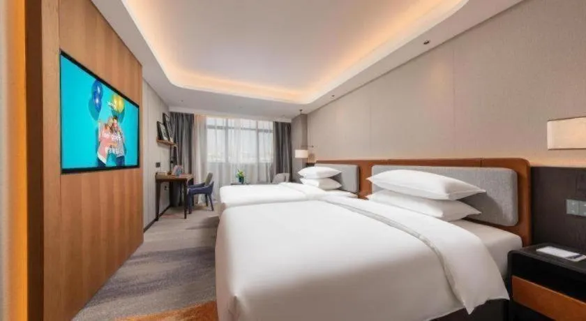 Bed in Park Inn Guangzhou Railway Station Yuexiu International Convention Center