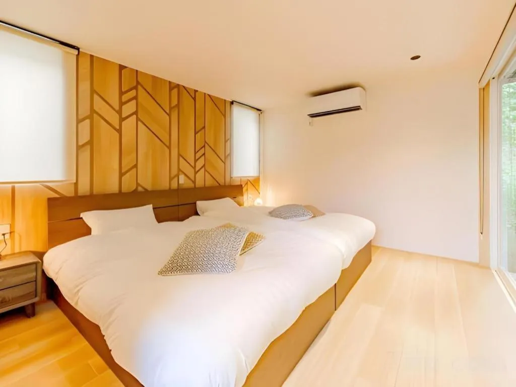 Bed in AWAUMI Fujikawaguchiko Resort