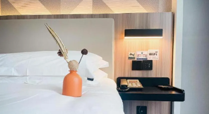 Bed in Borrman Hotel Jinhua Yiwu International Trade Mall