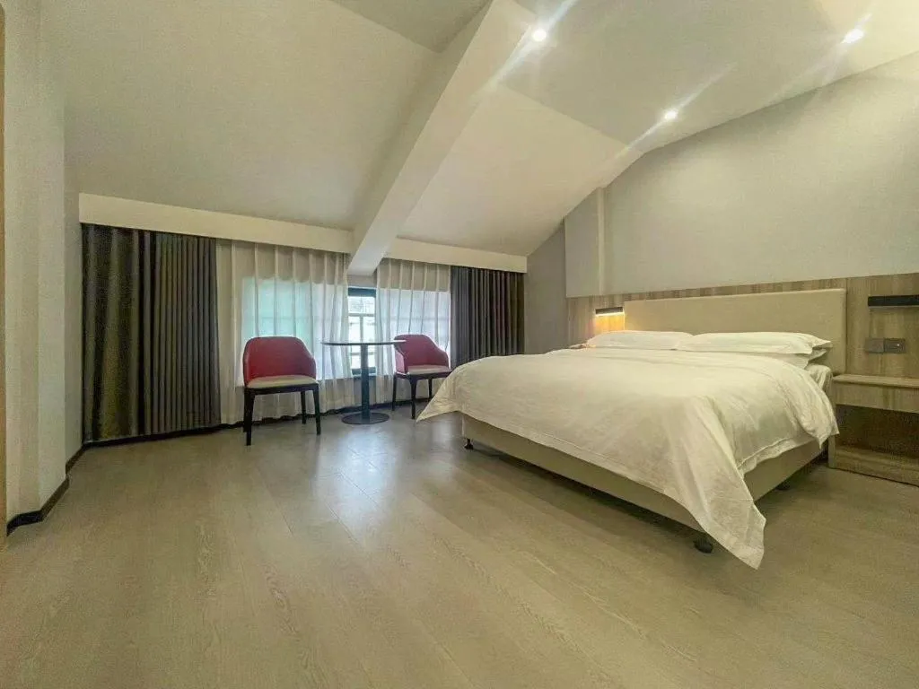 Bed in Borrman Hotel Jinhua Yiwu International Trade Mall