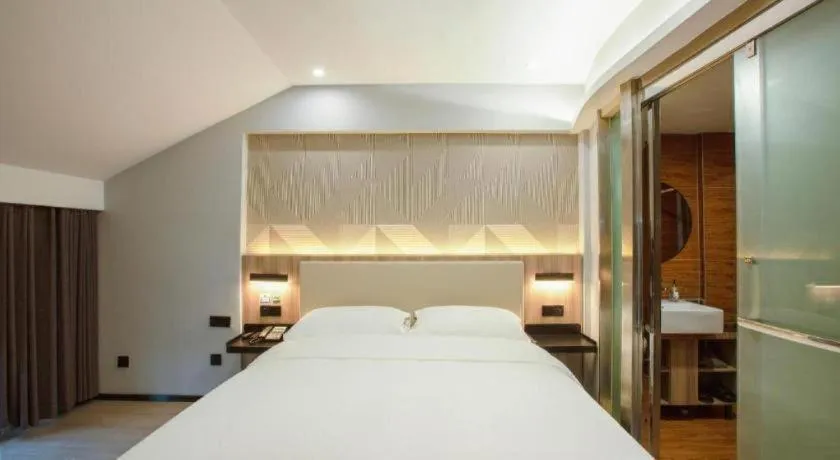 Bed in Borrman Hotel Jinhua Yiwu International Trade Mall
