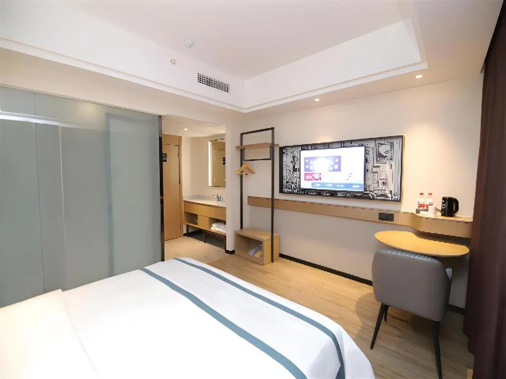 Bed in City Comfort Inn Changsha Sifangping University of National Defense Science and Technology