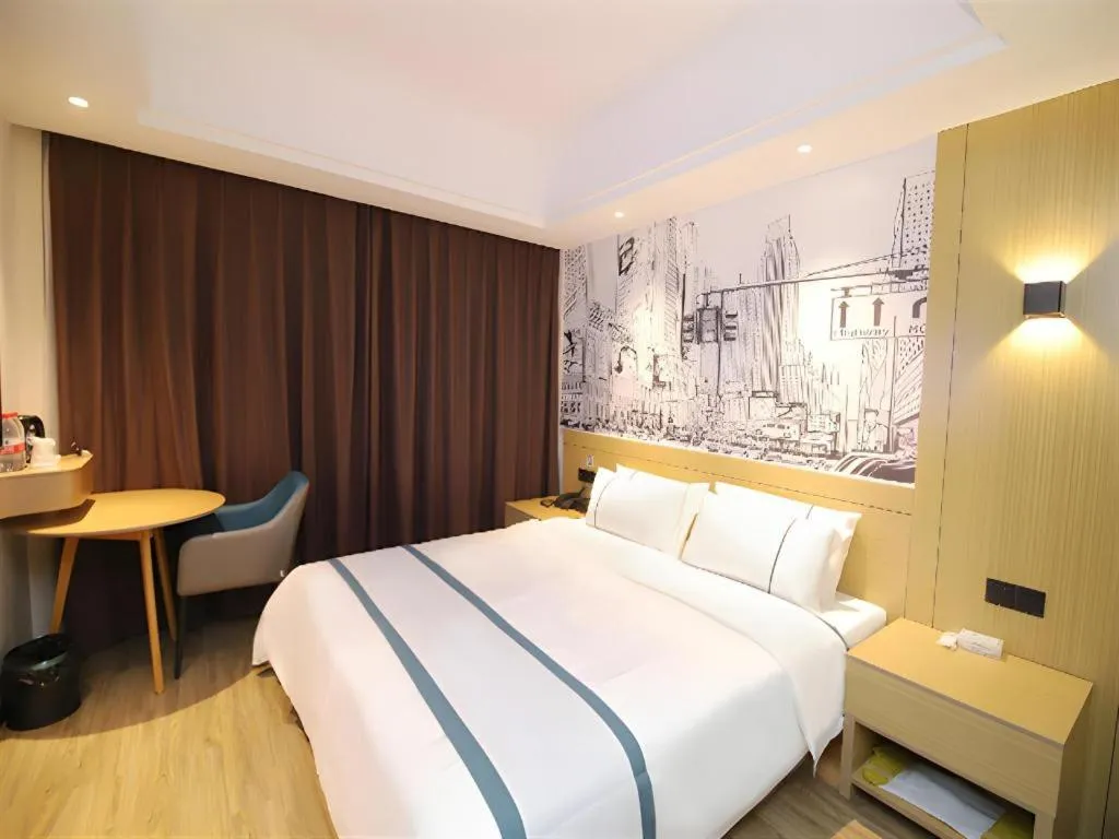 Bed in City Comfort Inn Changsha Sifangping University of National Defense Science and Technology