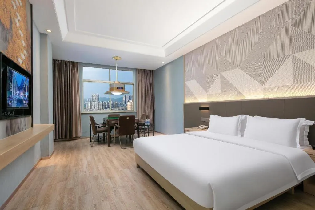 Bed in Borrman Hotel Changsha Yueliang Dao Guanziling Metro Station