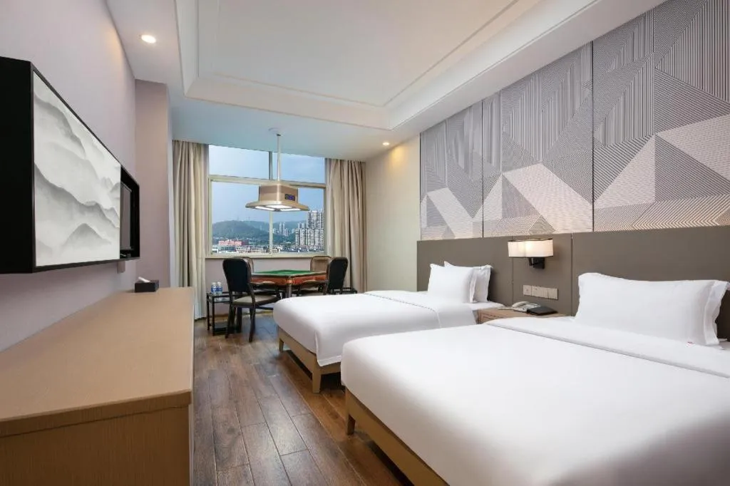 Bed in Borrman Hotel Changsha Yueliang Dao Guanziling Metro Station