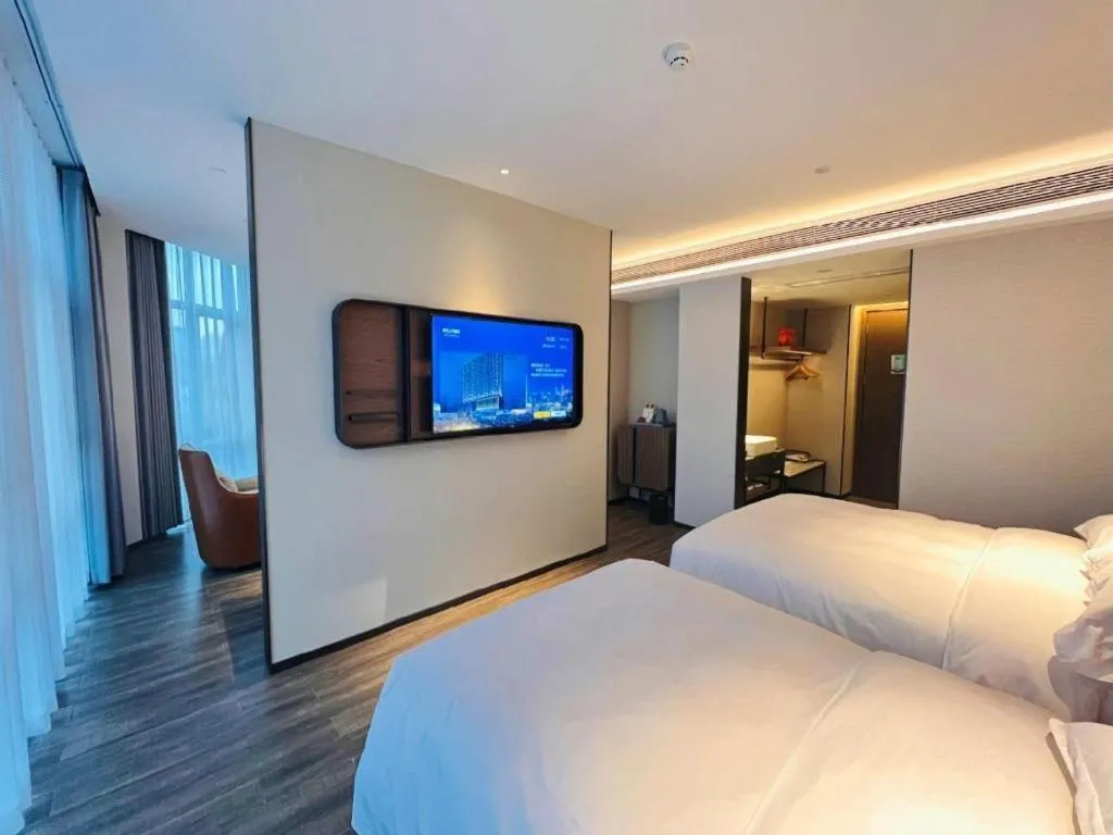 Bed in Echarm Hotel Changsha Huanghua Airport
