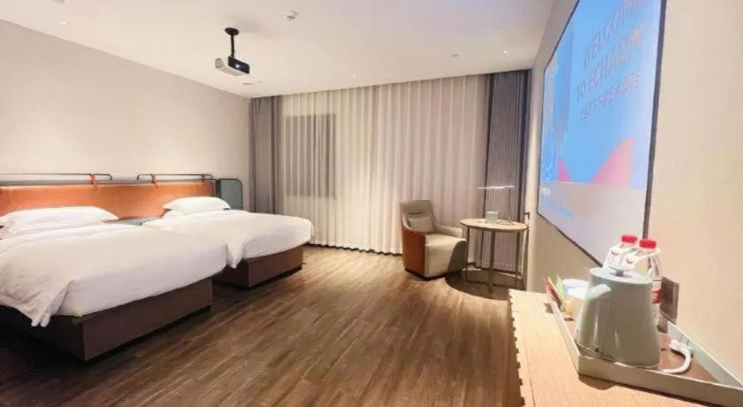 Bed in Echarm Hotel Changsha Huanghua Airport
