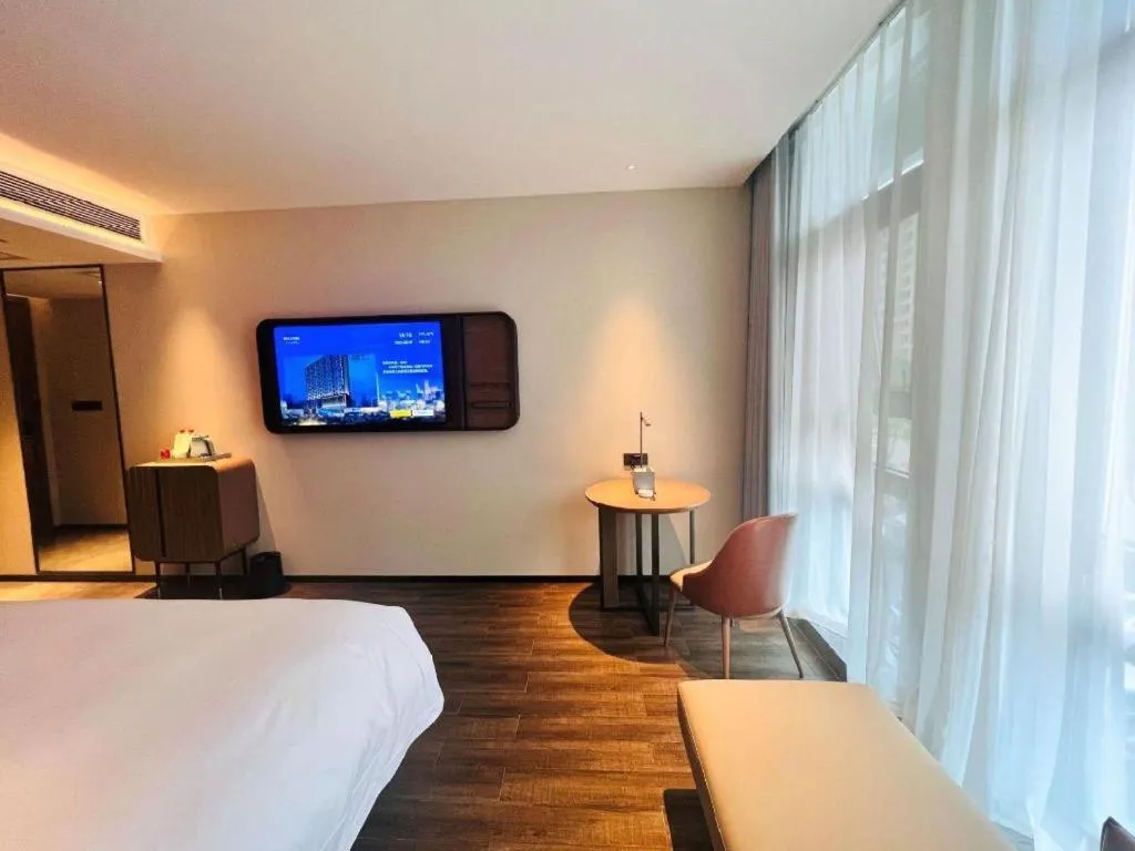 Bed in Echarm Hotel Changsha Huanghua Airport