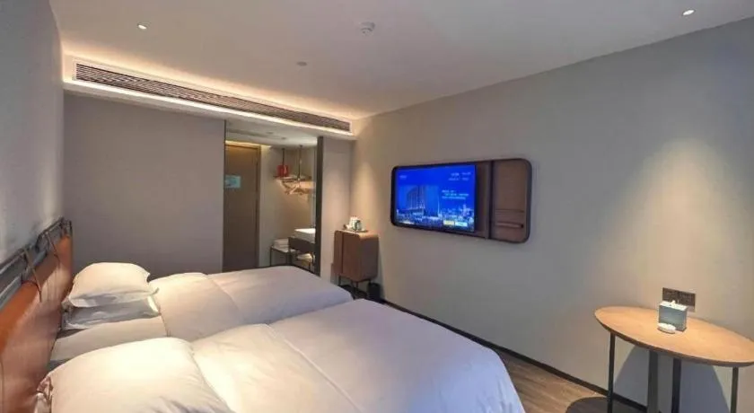Bed in Echarm Hotel Changsha Huanghua Airport