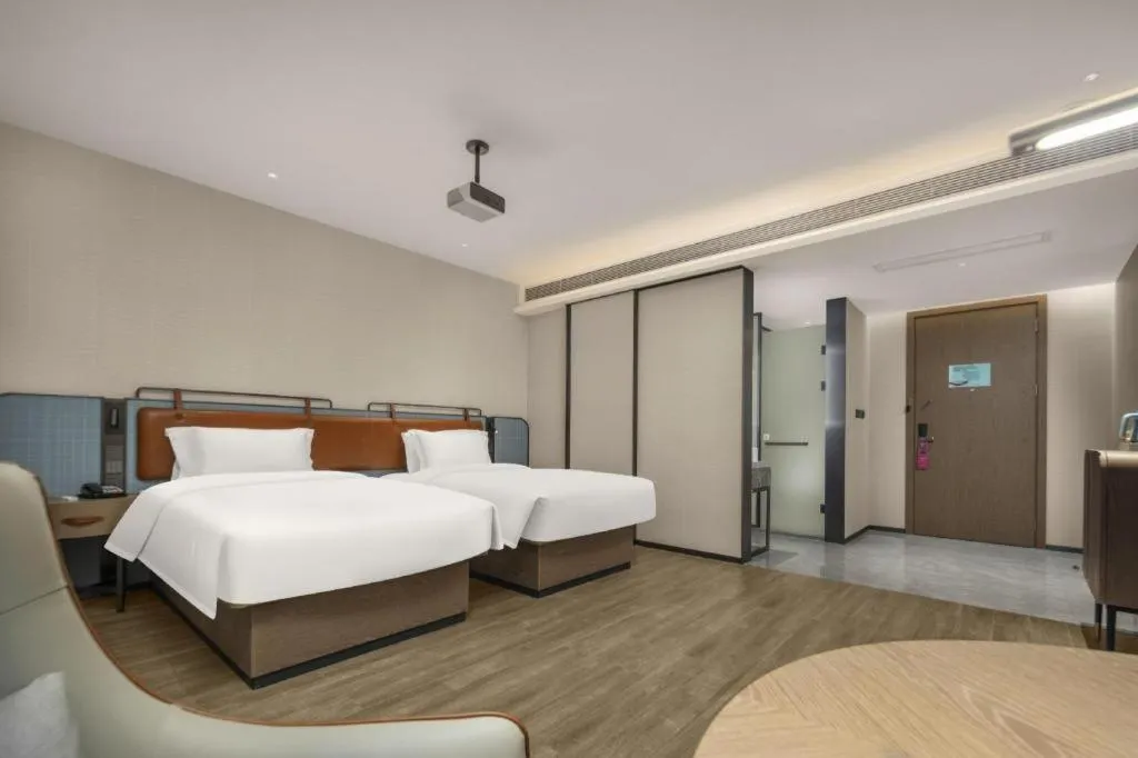 Bed in Echarm Hotel Changsha Huanghua Airport