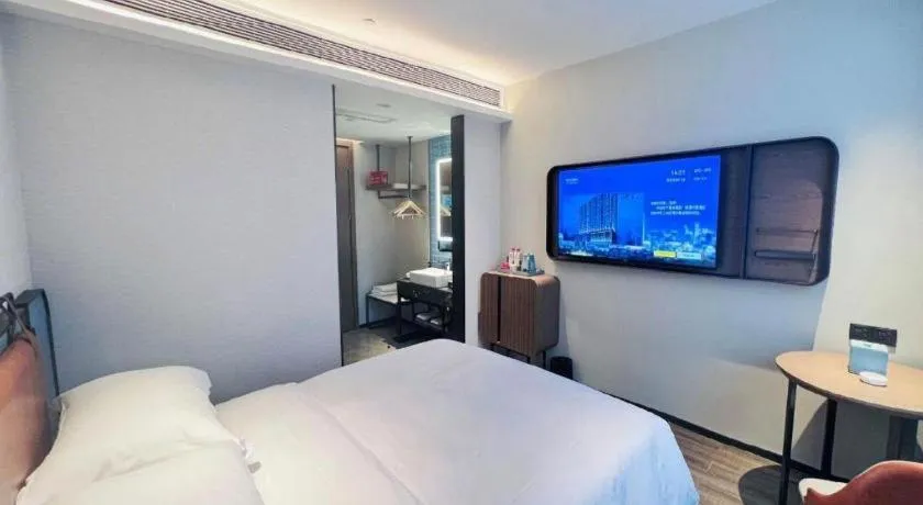 Bed in Echarm Hotel Changsha Huanghua Airport