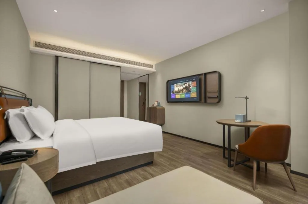 Bed in Echarm Hotel Changsha Huanghua Airport