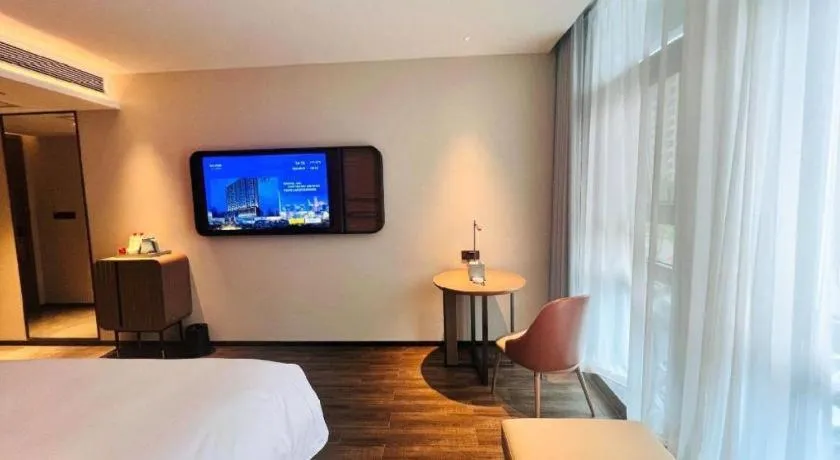 Bed in Echarm Hotel Changsha Huanghua Airport