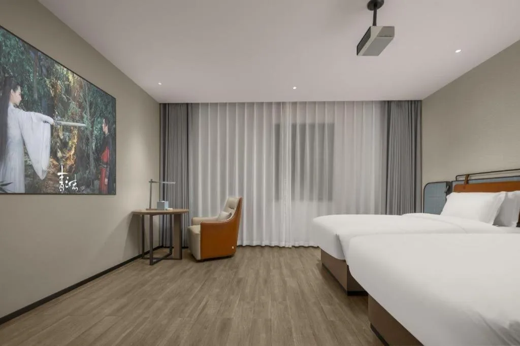 Bed in Echarm Hotel Changsha Huanghua Airport