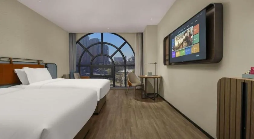 Bed in Echarm Hotel Changsha Huanghua Airport