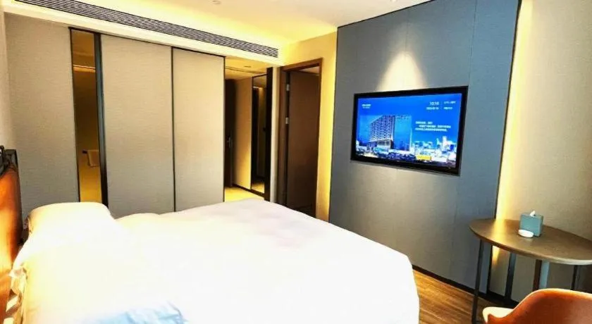 Bed in Echarm Hotel Changsha Huanghua Airport