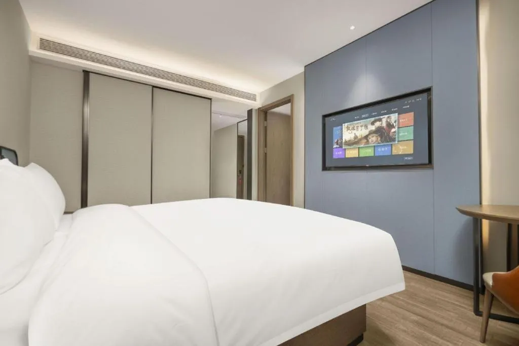 Bed in Echarm Hotel Changsha Huanghua Airport