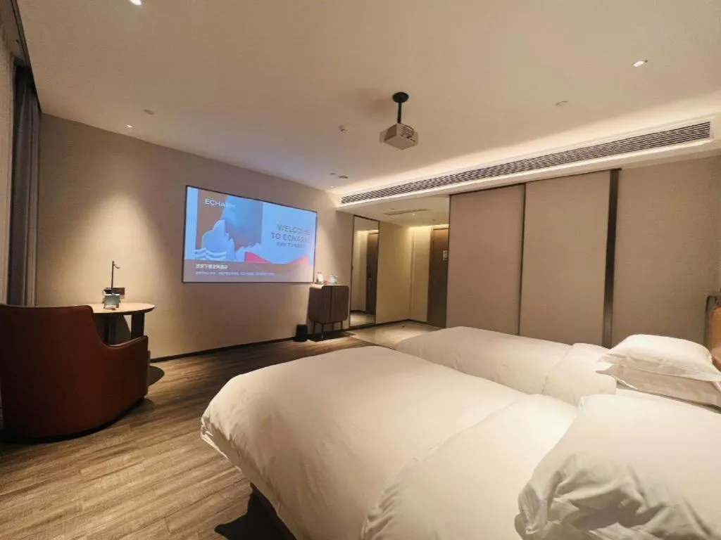Bed in Echarm Hotel Changsha Huanghua Airport
