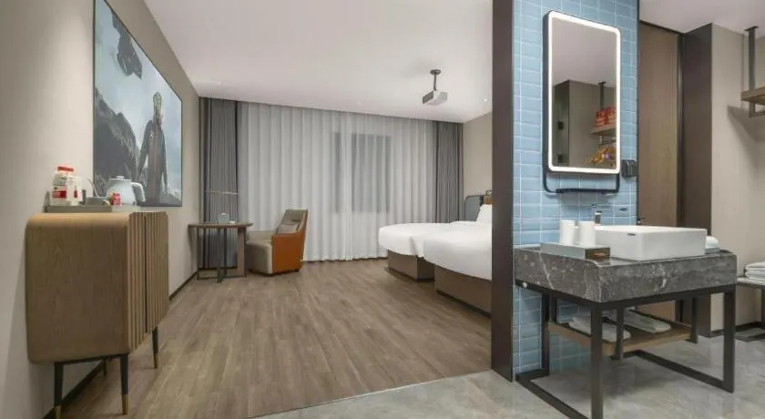 Bed in Echarm Hotel Changsha Huanghua Airport