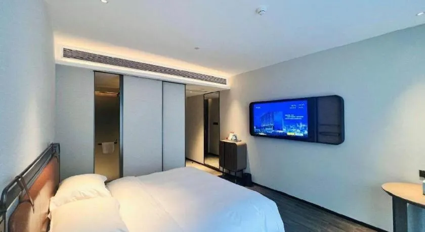 Bed in Echarm Hotel Changsha Huanghua Airport