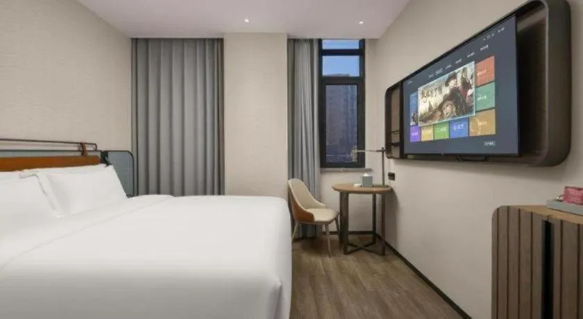 Bed in Echarm Hotel Changsha Huanghua Airport