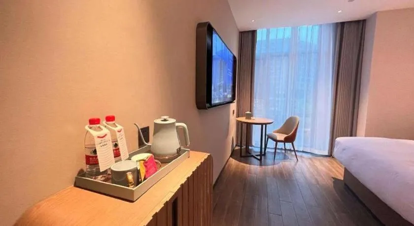 Bed in Echarm Hotel Changsha Huanghua Airport