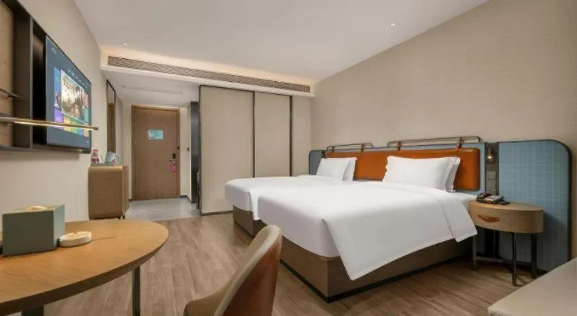 Bed in Echarm Hotel Changsha Huanghua Airport