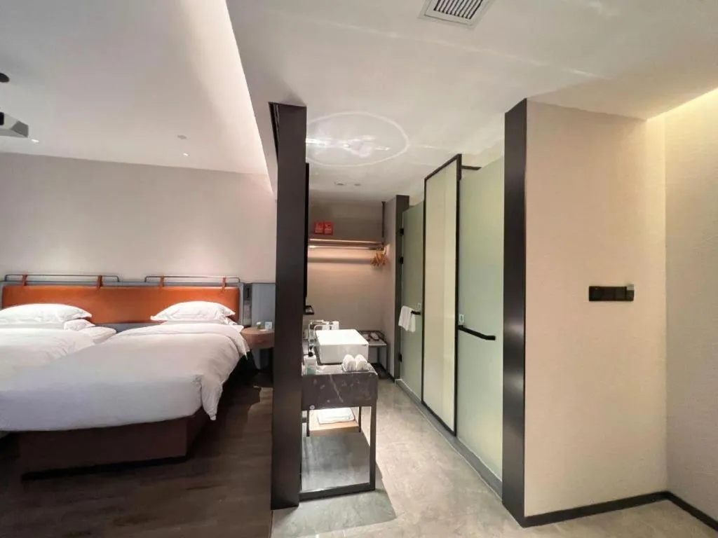 Bed in Echarm Hotel Changsha Huanghua Airport