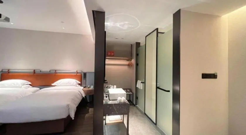 Bed in Echarm Hotel Changsha Huanghua Airport