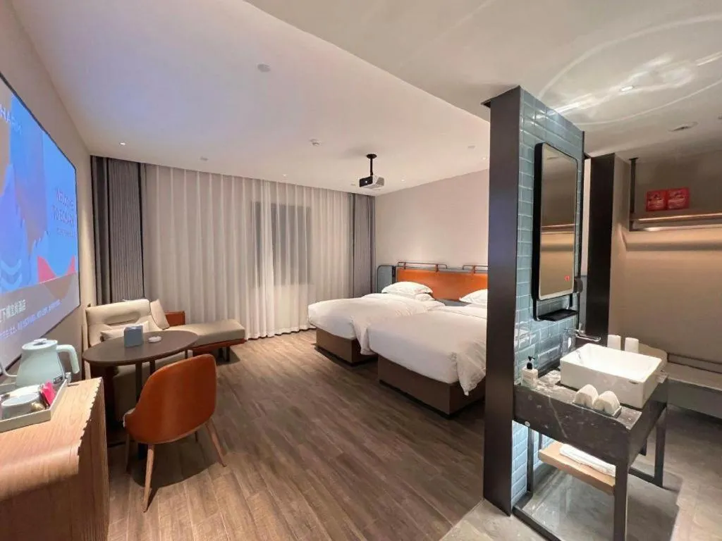 Bed in Echarm Hotel Changsha Huanghua Airport