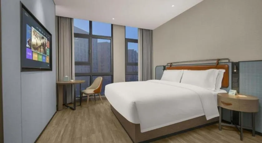 Bed in Echarm Hotel Changsha Huanghua Airport