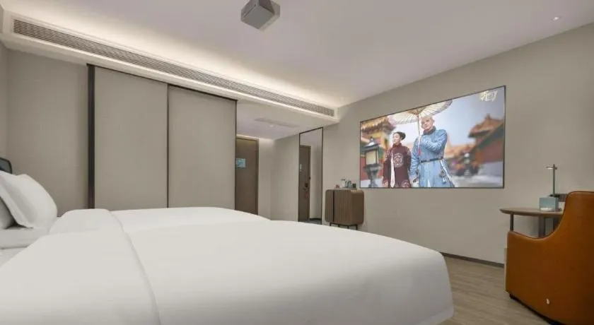 Bed in Echarm Hotel Changsha Huanghua Airport