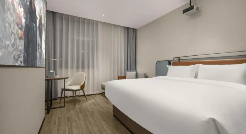 Bed in Echarm Hotel Changsha Huanghua Airport