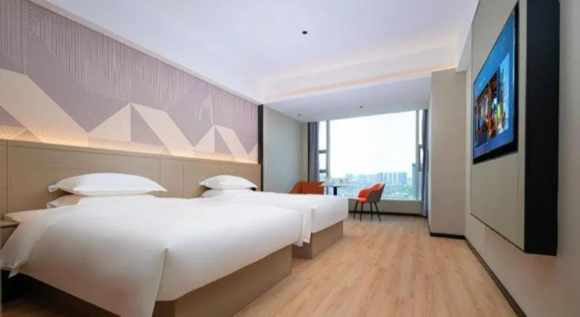 Bed in Borrman Hotel Yongzhou Lingling Ancient Town Government