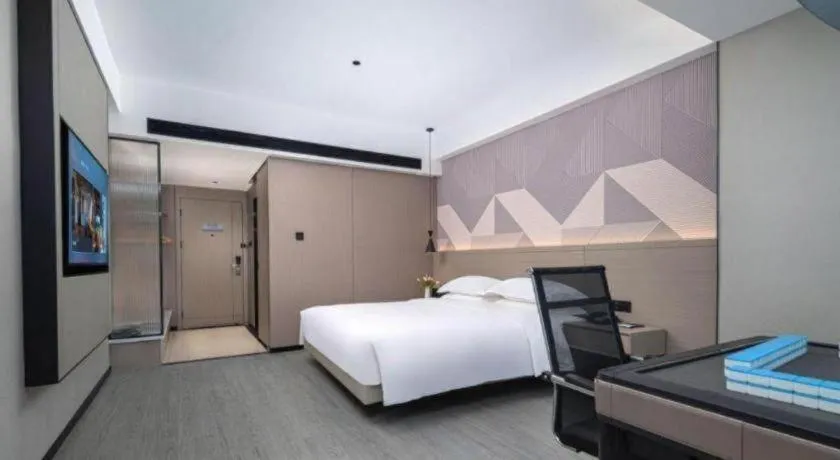 Bed in Borrman Hotel Yongzhou Lingling Ancient Town Government