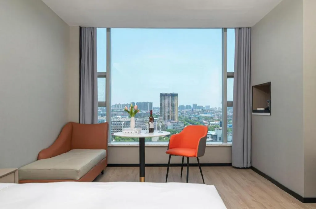 Bed in Borrman Hotel Yongzhou Lingling Ancient Town Government