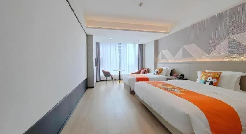 Bed in Borrman Hotel Yongzhou Lingling Ancient Town Government