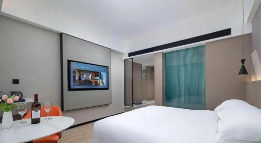 Bed in Borrman Hotel Yongzhou Lingling Ancient Town Government