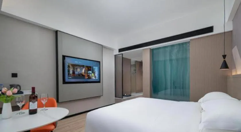 Bed in Borrman Hotel Yongzhou Lingling Ancient Town Government